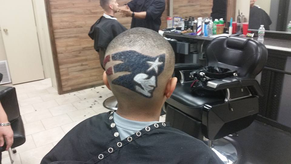 close-up of a custom haircut design by Atomic Salon