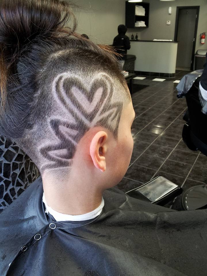 custom haircut design with heart detail